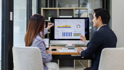 Business asian Team Reviewing Documents, business woman's hands meticulously reviewing a stack of...