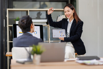 busy work Business team working at office multiple screen computer or smart tablet on table desk at office in documents data analyst, data science scientist for business.
