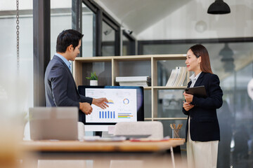 busy work Business team working at office multiple screen computer or smart tablet on table desk at office in documents data analyst, data science scientist for business.
