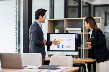 busy work Business team working at office multiple screen computer or smart tablet on table desk at office in documents data analyst, data science scientist for business.
