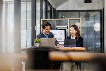 Business team working at office with documents on his desk, doing planning analyzing the financial...