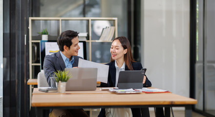 Business team working at office with documents on his desk, doing planning analyzing the financial...