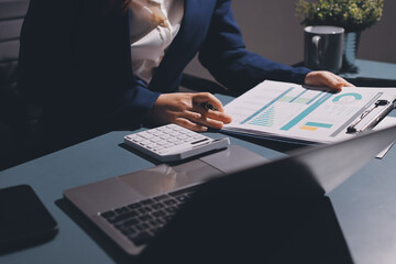 Expert woman asian female people review data number costing managerial account prepare monthly...