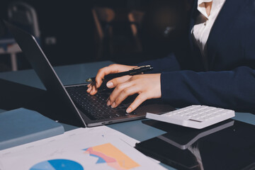 Expert woman asian female people review data number costing managerial account prepare monthly...