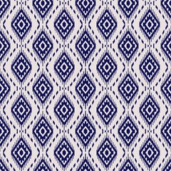 Geometric pattern featuring interlocking diamond shapes in a navy blue hue on a light beige background. 