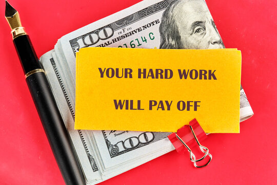 Naklejki Concept of building success foundation. Text YOUR HARD WORK WILL PAY OFF