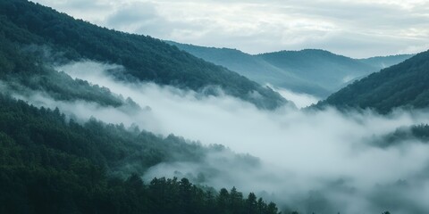 Mist Rolling Over Mountain Ridges