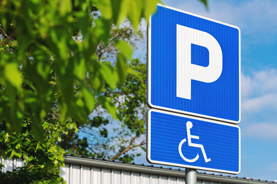 Accessible parking space sign on the street