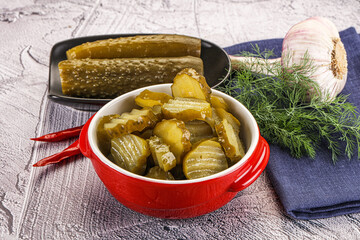Sliced marinated cucumbers in the bowl