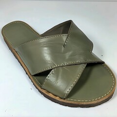 Elegant olive-green leather slide sandal featuring a stitched cross design