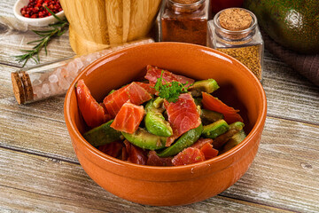 Salad with avocado and salmon