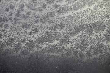 Frost Patterns on Window Glass during Winter Morning, Close-Up Abstract Ice Crystals, Natural Artistic Snowflakes