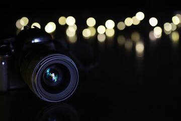 Professional Camera Lens with Bokeh Effect in Dark Background for Photography and Videography