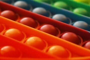 Close-Up of Colorful Pop It Fidget Toys - Sensory Stress Relief and Relaxation