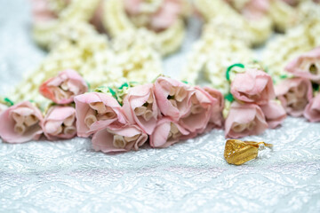 Gold ring , Wedding ring,Diamond ring on the flowers.