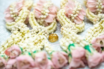 Gold ring , Wedding ring,Diamond ring on the flowers.