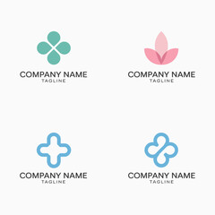  Four Simple Medical Logos with Cross and Leaf Designs