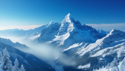 Majestic Snowy Mountain Range Under a Clear Blue Sky in Winter Season