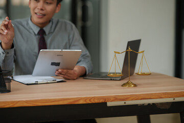 Male lawyer working on legal matters in an office