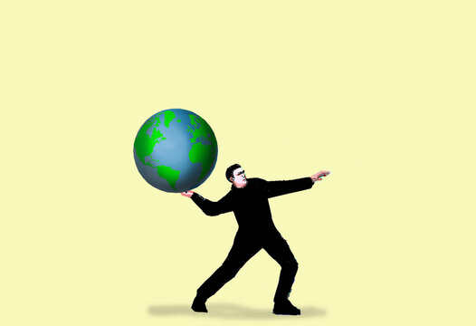 Illustration of a man holding a globe on a yellow background symbolizing global responsibility