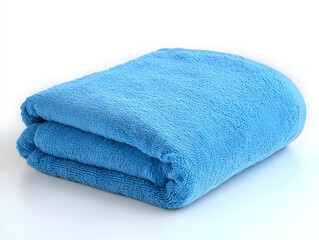 Soft blue bath towels, clean and folded, are stacked on a white background, isolated for hygiene and spa use