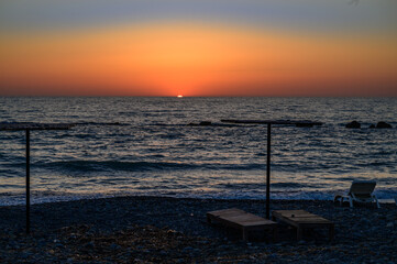 Breathtaking view of the sun setting over the Mediterranean Sea, captured from the coast of Cyprus.