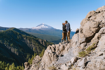 Fototapeta premium Tourists admiring breathtaking view of volcano Teide. Tenerife, Canary Islands, Spain.