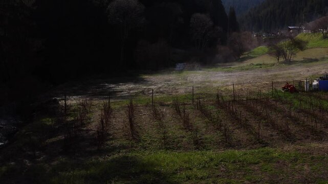 Establishing aerial footage of a small town in the mountain