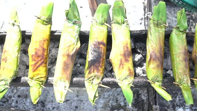 Acehnese specialty food, sticky rice wrapped in banana leaves and grilled