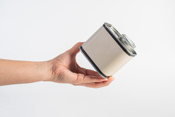 White can for packaging in hand on white background.