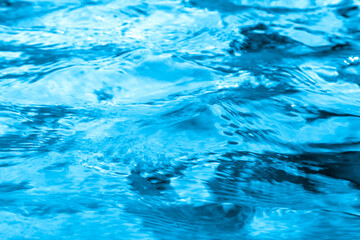 Naklejka premium Image of blue water moving like waves