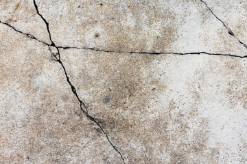 Old concrete floor background with cracks on the road surface