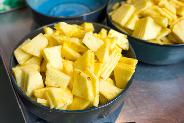 juicy yellow pineapple chunks, appetizing tropical fruit snack