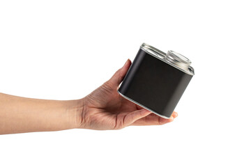 Black can for packaging in hand on transparent background.