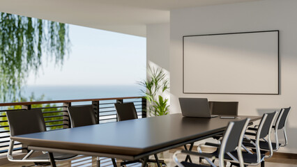 A blank whiteboard hanging on the wall of an open air meeting room with long black table and armchair.