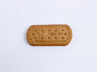 Single chocolate cream sandwich biscuit isolated on white background