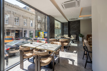 interior of a restaurant bathed in morning sunlight