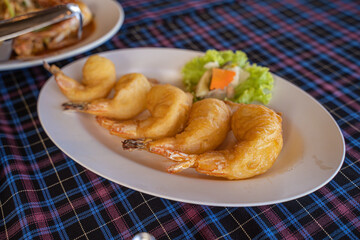 Ebi furai is a Japanese dish made from shrimp coated  in a restaurant by the sea, Phuket
