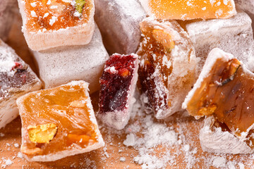 Sweet food Turkish delight, assorted rahat locum in form of cubes with nuts and powdered sugar, traditional food