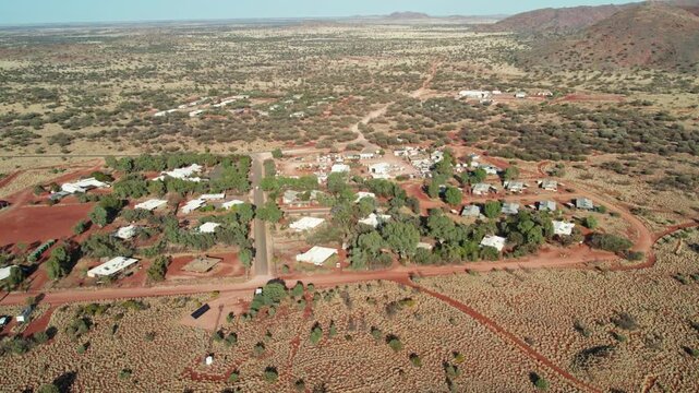 Reverse aerial view of the town of Umuwa, South Australia, Australia. August 2022.