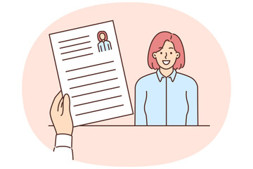 Resume of woman applying for vacancy in company in recruiters hand