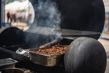 Smoking Meat on Barbecue Grill Outdoors