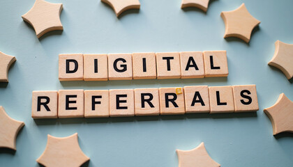Digital Referrals Word Blocks On Blue Background With Star Shapes