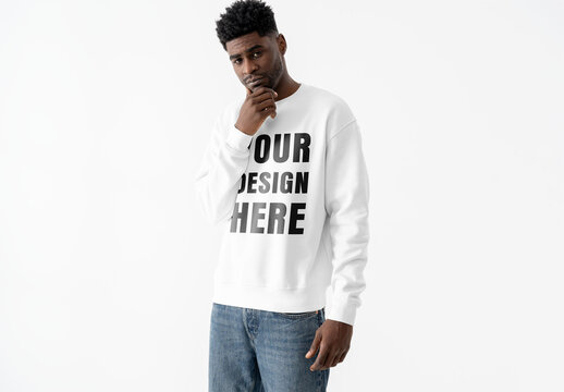 Mockup Of Man Wearing Customizable Top, Hand On Chin