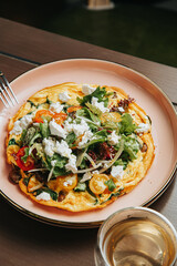 Salad with dressing and fresh vegetables