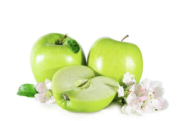 Green juicy whole and sliced ​​apples with flowers and leaves. Isolated on white.