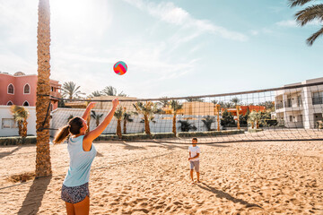 Photo from Hurghada in Egypt mother and son playing beach volleyball