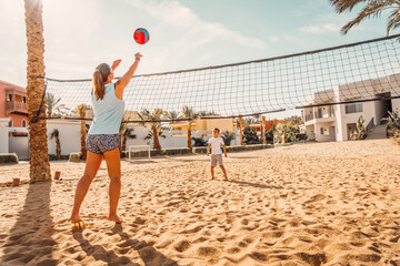 Photo from Hurghada in Egypt mother and son playing beach volleyball