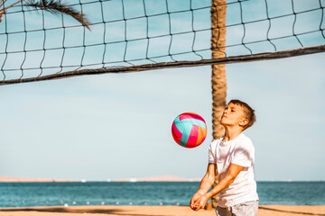 Photo from Hurghada in Egypt mother and son playing beach volleyball
