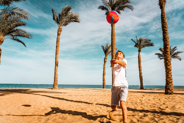 Photo from Hurghada in Egypt mother and son playing beach volleyball